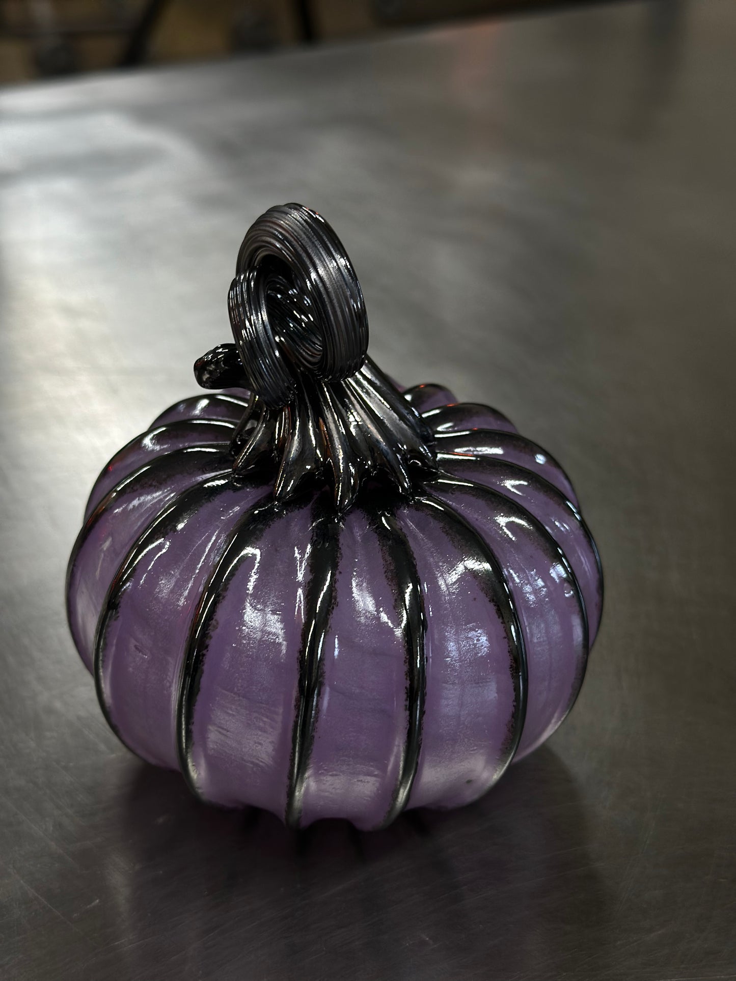 108 Lilac and black glass pumpkin.