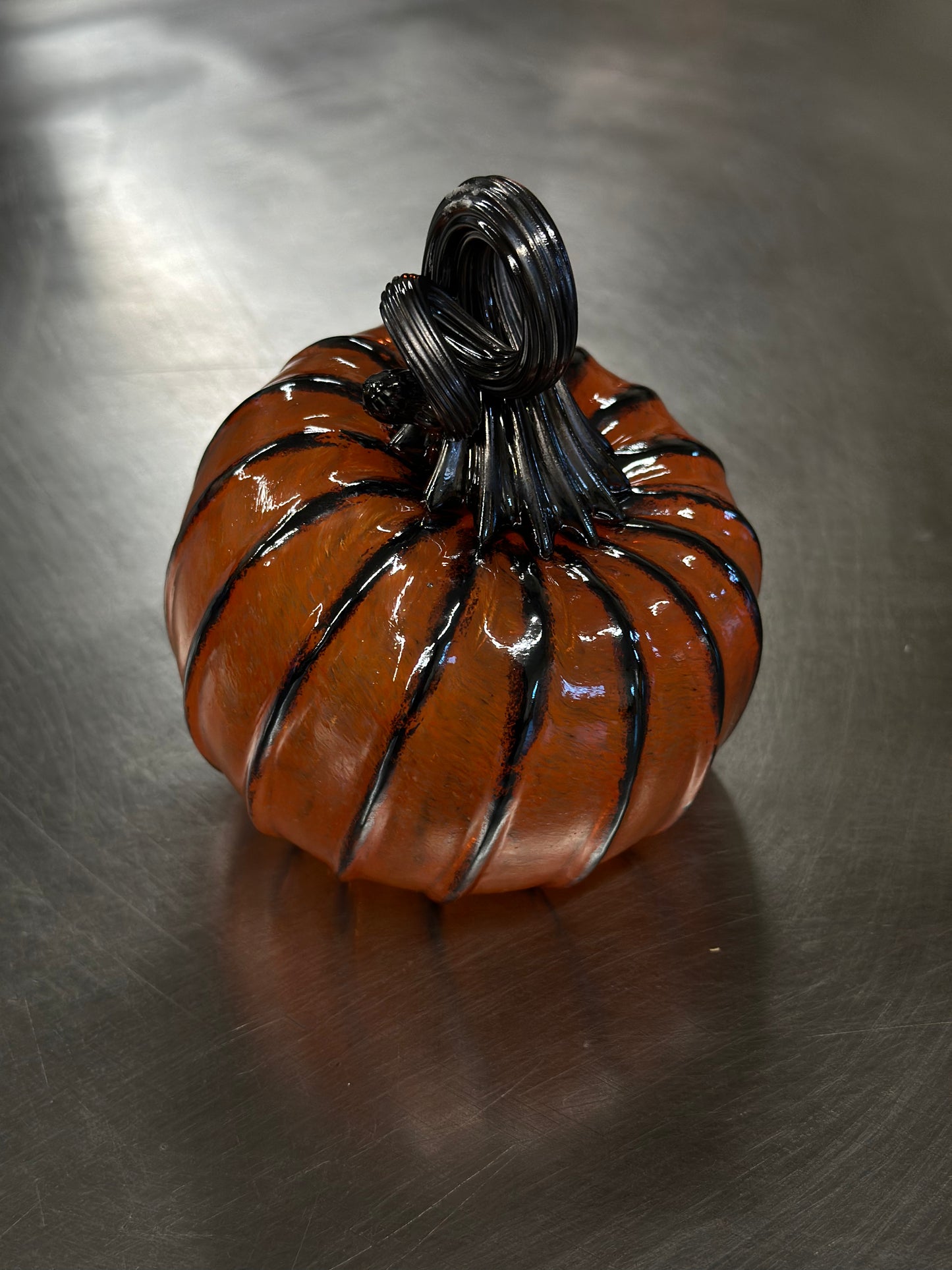 109 Transparent orange and blank glass pumpkin.