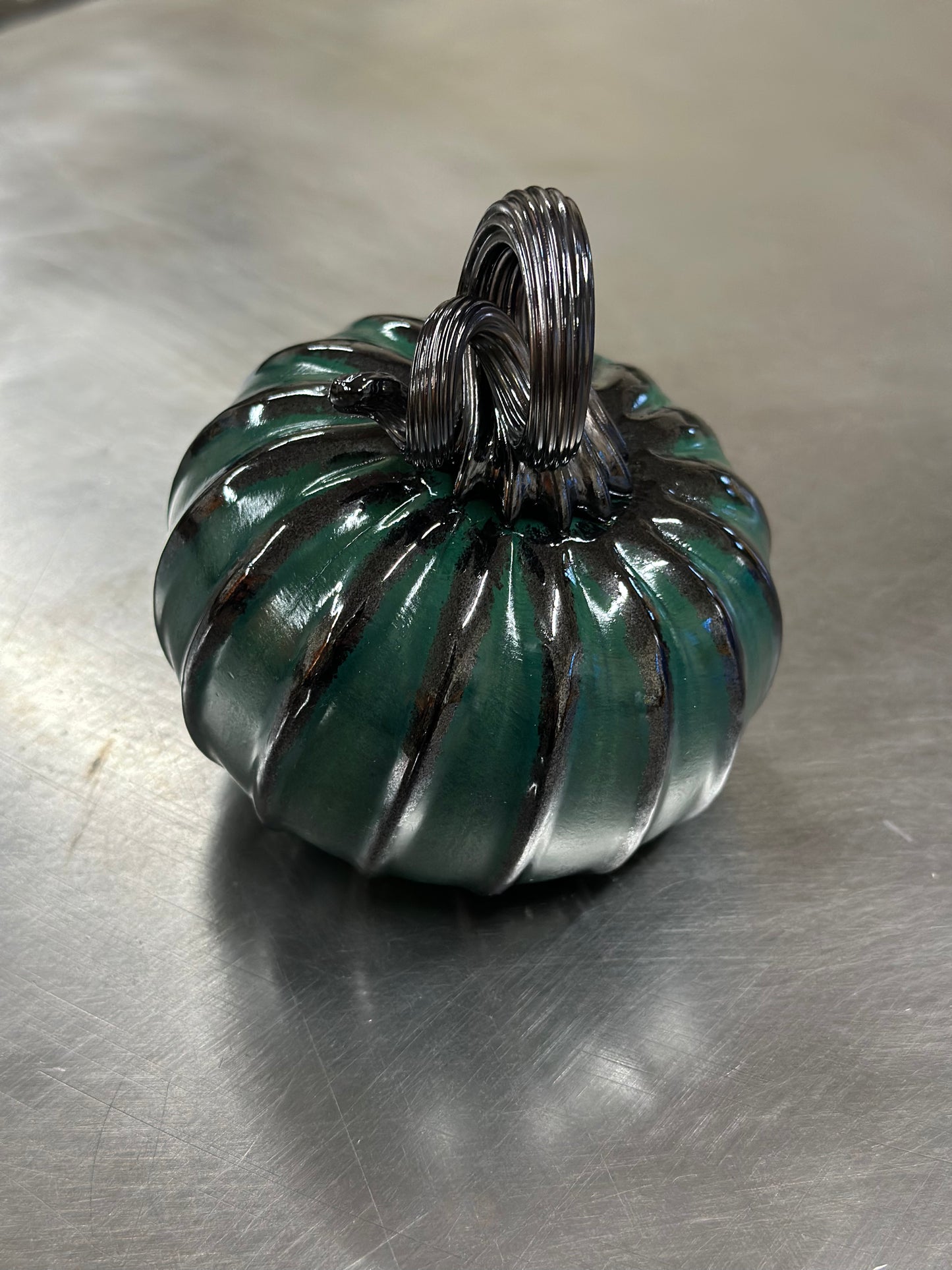 112 Forest green and black glass pumpkin.