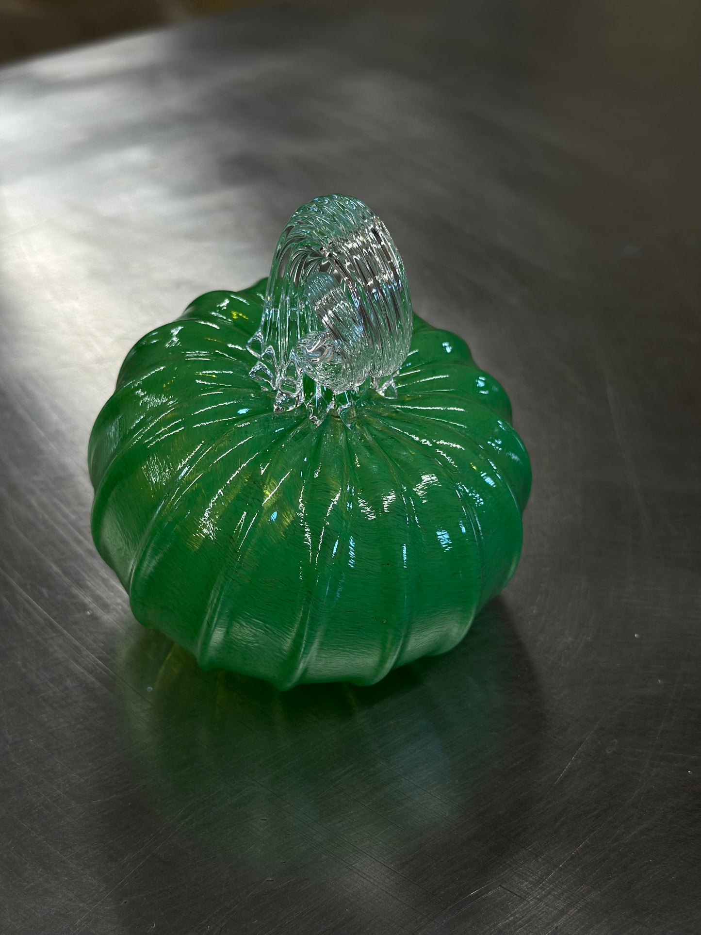 121 Green and clear glass pumpkin.